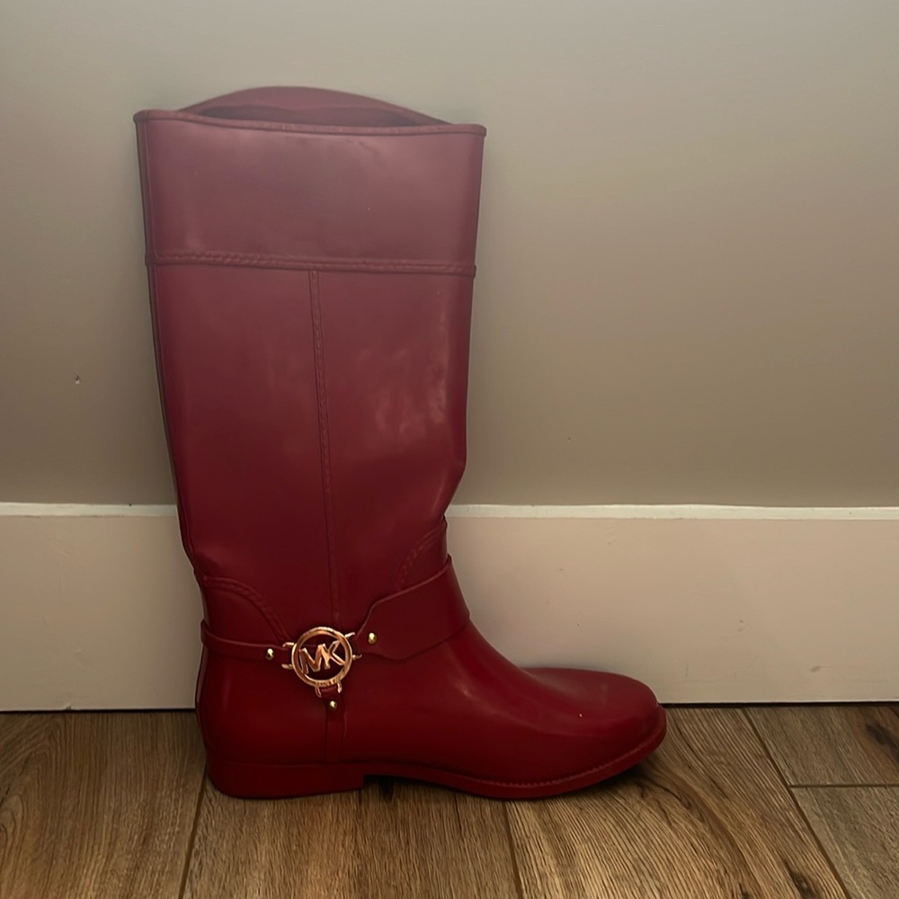 Red Michael Koran’s rain boots